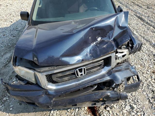 Photo 11 from auction – 2011 HONDA RIDGELINE with VIN 5FPYK1F21BB455382