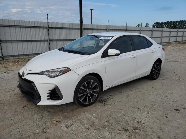 TOYOTA COROLLA L 2017 with VIN 2T1BURHE5HC815460 - Photo from auction