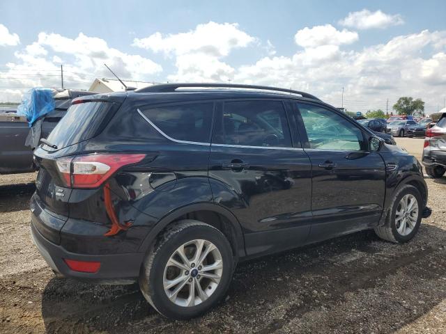 Photo 3 from auction – 2017 FORD ESCAPE SE with VIN 1FMCU9G98HUD68064