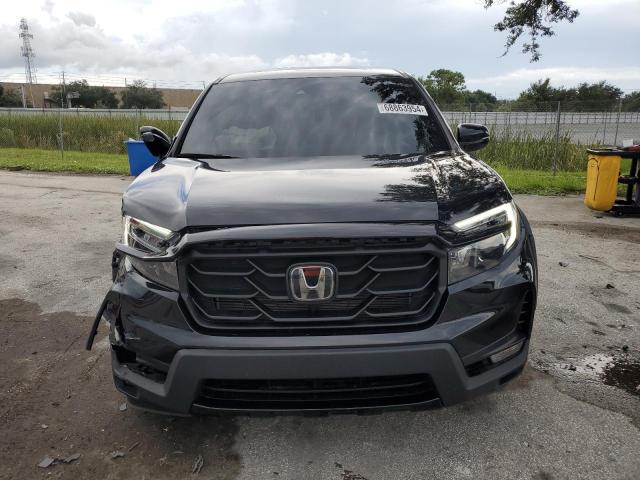 Photo 5 from auction – 2023 HONDA RIDGELINE with VIN 5FPYK3F87PB022124