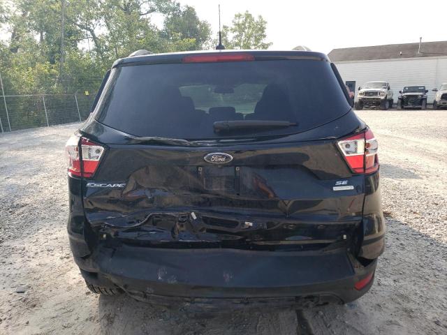 Photo 6 from auction – 2018 FORD ESCAPE SE with VIN 1FMCU0GD7JUC52716