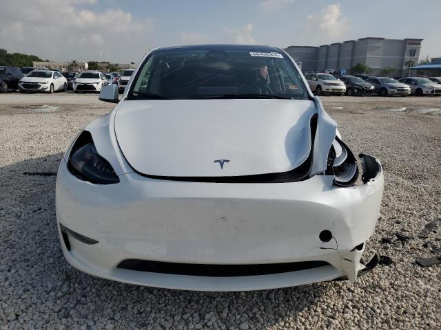 Photo 5 from auction – 2023 TESLA MODEL Y with VIN 7SAYGAEE8PF908350