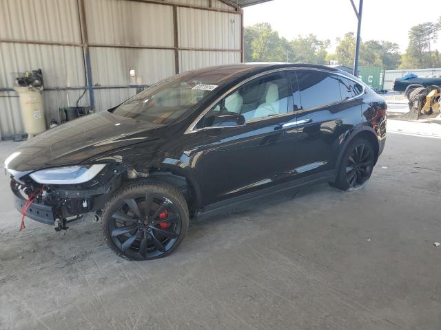 TESLA MODEL X 2017 with VIN 5YJXCDE23HF065381 - Photo from auction