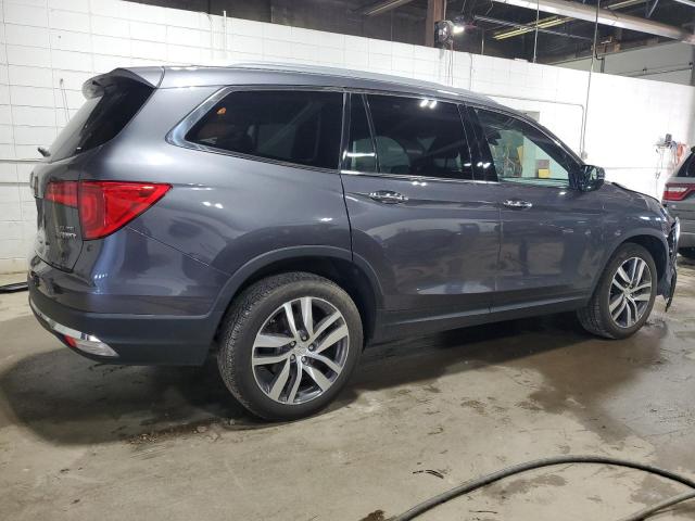Photo 3 from auction – 2018 HONDA PILOT ELIT with VIN 5FNYF6H0XJB032028