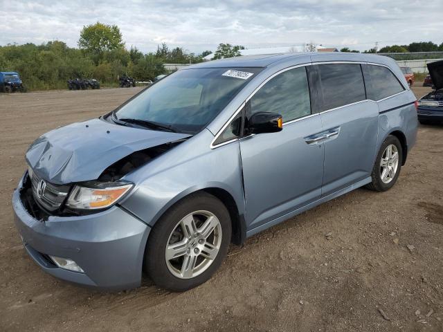 HONDA ODYSSEY TO 2012 with VIN 5FNRL5H92CB075089 - Photo from auction