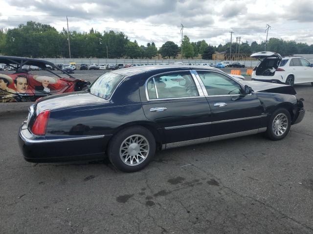 Photo 3 from auction – 2000 LINCOLN TOWN CAR E with VIN 1LNHM81W8YY847222