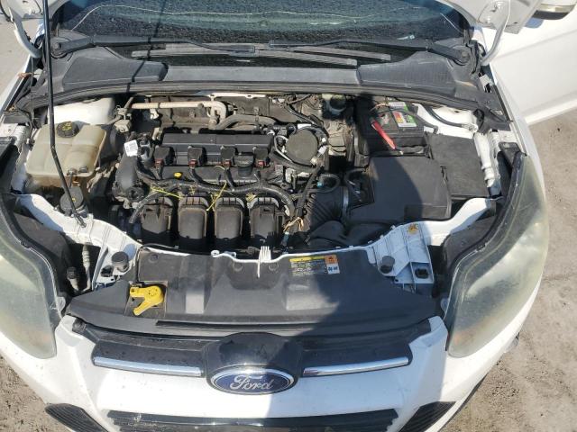 Photo 11 from auction – 2014 FORD FOCUS TITANIUM with VIN 1FADP3J26EL218485