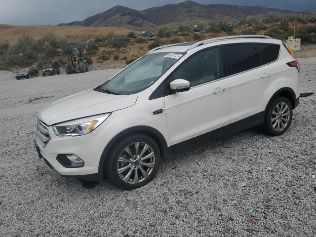 FORD ESCAPE TITANIUM 2017 with VIN 1FMCU0J96HUB81328 - Photo from auction