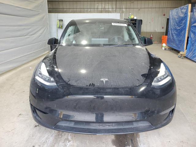 Photo 5 from auction – 2022 TESLA MODEL Y with VIN 7SAYGAEE6NF323926