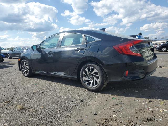 Photo 2 from auction – 2018 HONDA CIVIC EX with VIN 19XFC2F73JE201191
