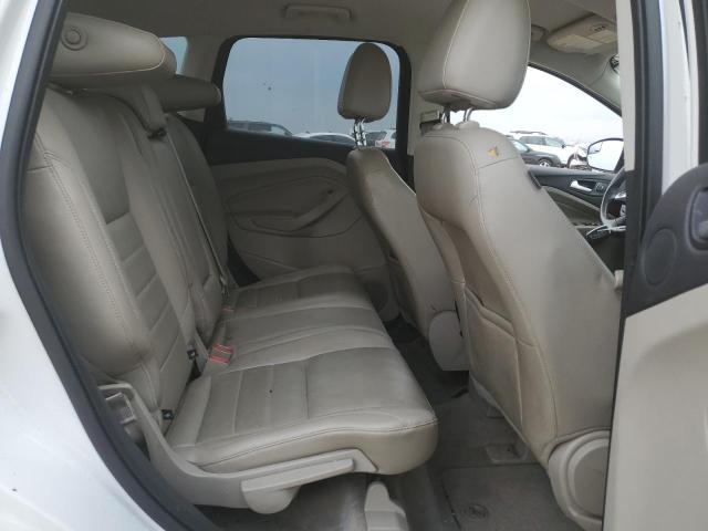 Photo 11 from auction – 2014 FORD ESCAPE TIT with VIN 1FMCU9J98EUA07454