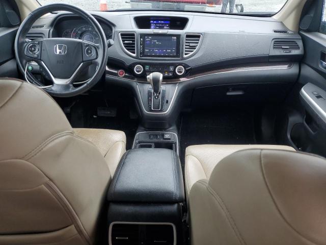 Photo 8 from auction – 2015 HONDA CR-V with VIN 2HKRM4H71FH611235