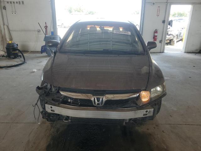 Photo 5 from auction – 2011 HONDA CIVIC LX with VIN 19XFA1F57BE018540