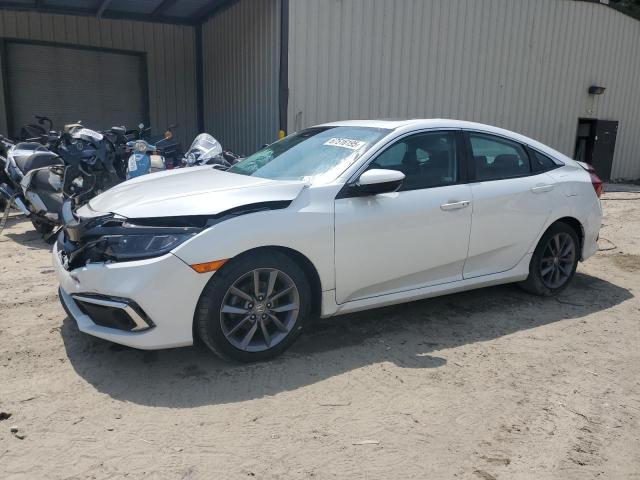 HONDA CIVIC EX 2021 with VIN 19XFC1F39ME200090 - Photo from auction