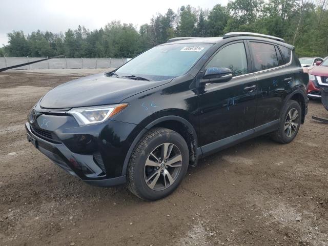 Photo 1 from auction – 2018 TOYOTA RAV4 LE with VIN 2T3BFREV3JW811711