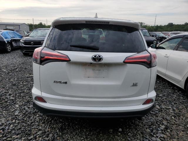Photo 6 from auction – 2018 TOYOTA RAV4 LE with VIN 2T3BFREV4JW718678