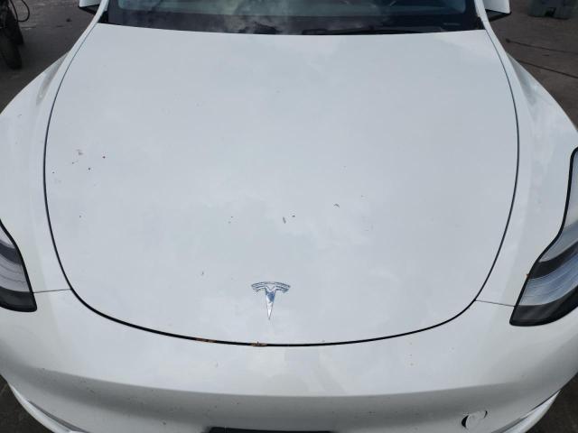 Photo 11 from auction – 2021 TESLA MODEL Y with VIN 5YJYGDED2MF130273