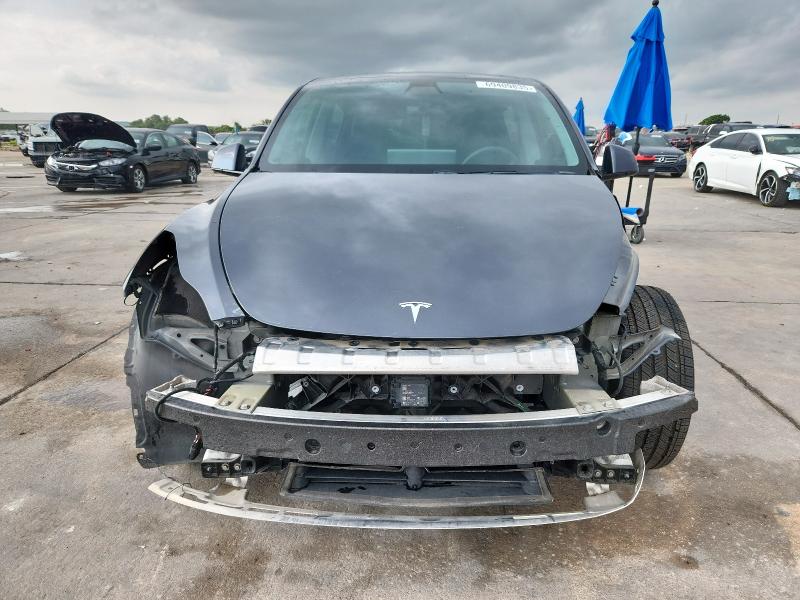 Photo 5 from auction – 2021 TESLA MODEL Y with VIN 5YJYGDEE2MF065532