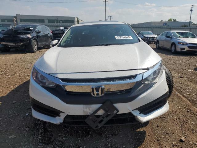Photo 5 from auction – 2018 HONDA CIVIC EX with VIN 19XFC2F70JE038645