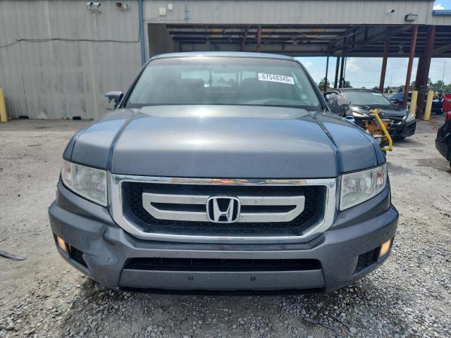 Photo 5 from auction – 2011 HONDA RIDGELINE with VIN 5FPYK1F47BB002658
