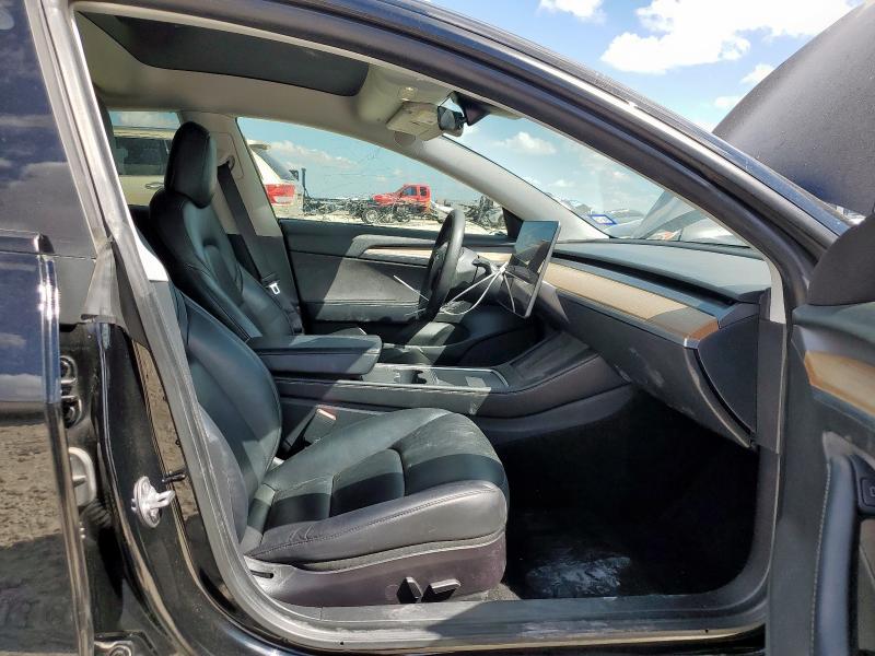 Photo 7 from auction – 2021 TESLA MODEL 3 with VIN 5YJ3E1EA8MF017285