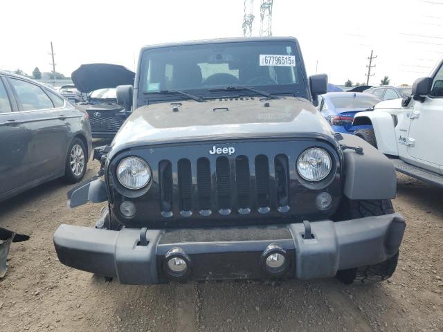 Photo 5 from auction – 2015 JEEP WRANGLER U with VIN 1C4BJWDG7FL589930
