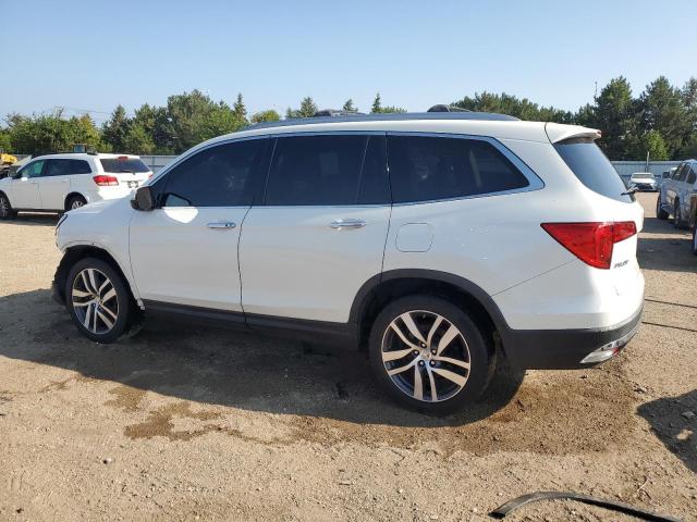 Photo 2 from auction – 2017 HONDA PILOT ELIT with VIN 5FNYF6H08HB094697