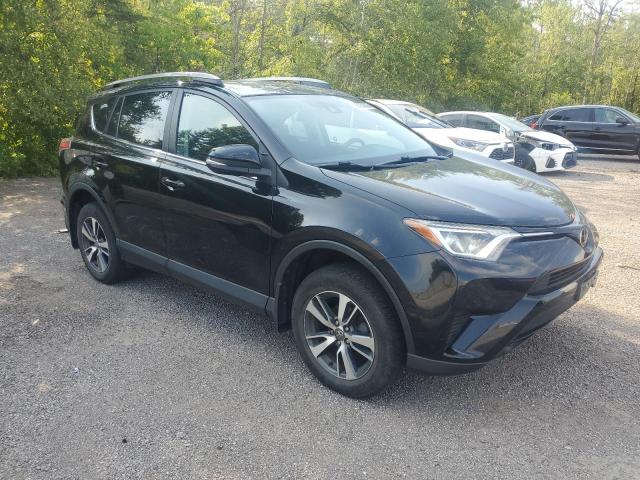 Photo 4 from auction – 2018 TOYOTA RAV4 LE with VIN 2T3ZFREV5JW472061