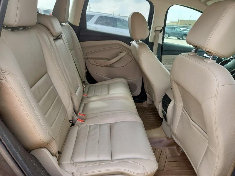 Photo 10 from auction – 2016 FORD ESCAPE with VIN 1FMCU0J97GUB46778