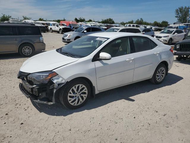TOYOTA COROLLA L 2018 with VIN 5YFBURHE6JP773614 - Photo from auction