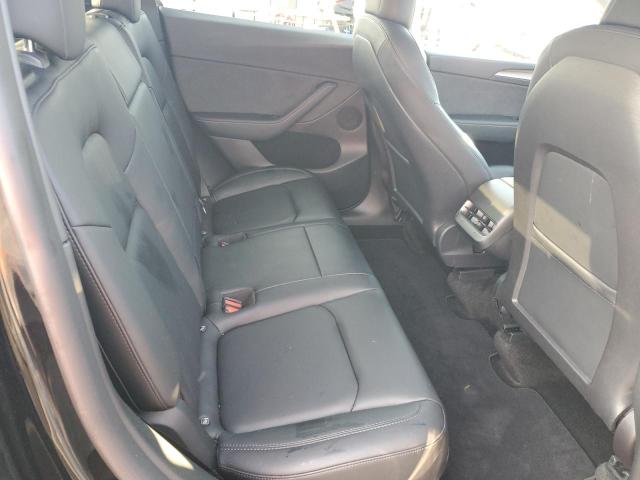 Photo 11 from auction – 2022 TESLA MODEL Y with VIN 7SAYGDEF0NF521167