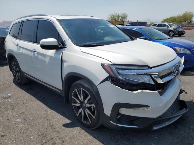 Photo 4 from auction – 2022 HONDA PILOT TOURING with VIN 5FNYF5H64NB020140
