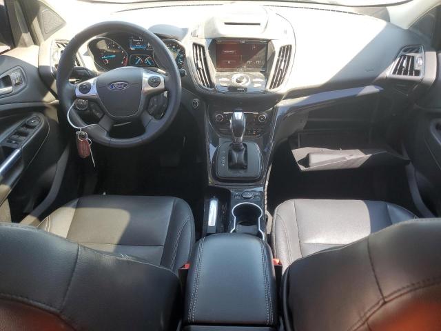 Photo 8 from auction – 2014 FORD ESCAPE TITANIUM with VIN 1FMCU9J98EUE27845