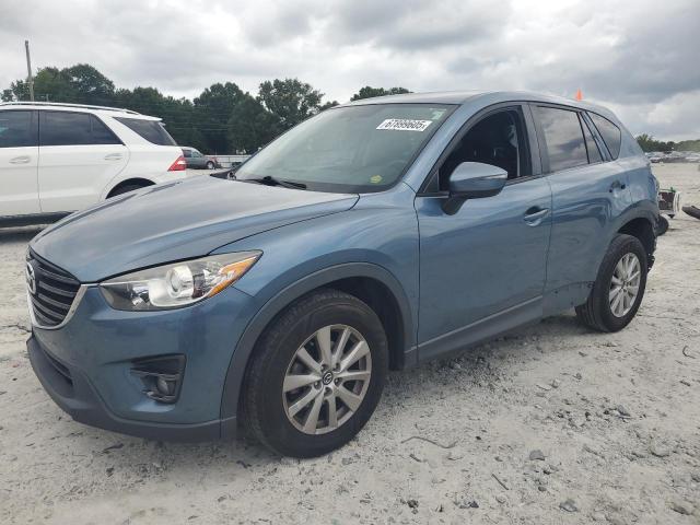 Photo 1 from auction – 2016 MAZDA CX-5 TOURI with VIN JM3KE2CY2G0866193
