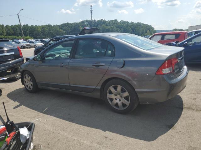 Photo 2 from auction – 2011 HONDA CIVIC LX with VIN 19XFA1F50BE000915