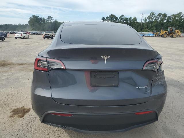 Photo 6 from auction – 2023 TESLA MODEL Y with VIN 7SAYGAEE7PF912809