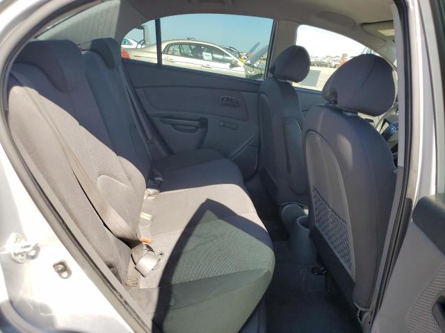 Photo 10 from auction – 2011 KIA RIO BASE with VIN KNADH4A30B6721104