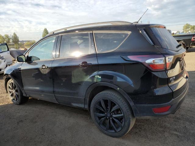 Photo 2 from auction – 2017 FORD ESCAPE TITANIUM with VIN 1FMCU9J94HUE77968