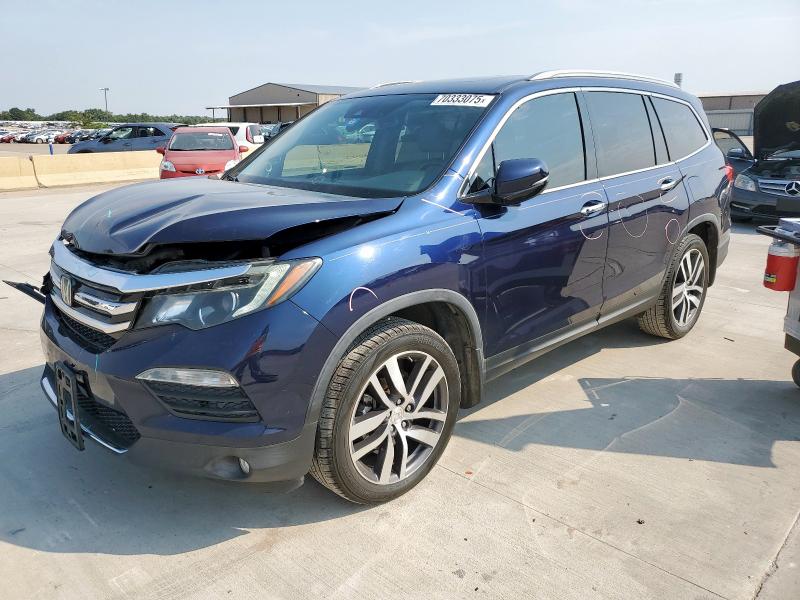 HONDA PILOT TOURING 2018 with VIN 5FNYF5H94JB006212 - Photo from auction