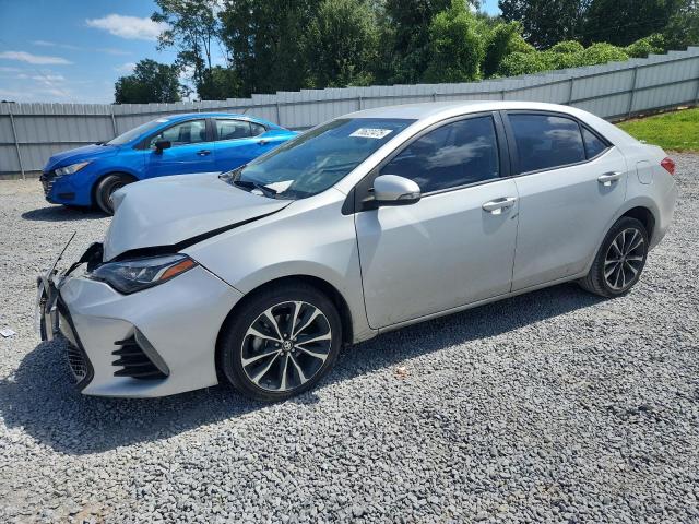 TOYOTA COROLLA L 2017 with VIN 2T1BURHE0HC877980 - Photo from auction