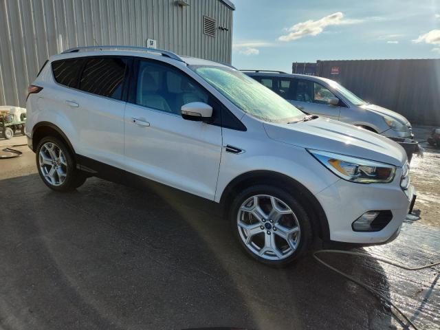 Photo 4 from auction – 2017 FORD ESCAPE TIT with VIN 1FMCU9J90HUA47208