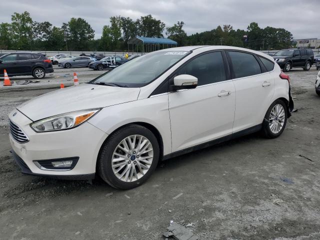 FORD FOCUS TITANIUM 2016 with VIN 1FADP3N22GL212468 - Photo from auction