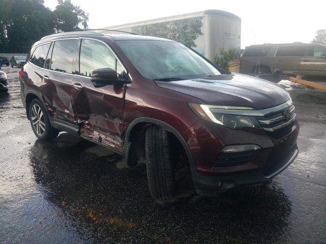 Photo 4 from auction – 2017 HONDA PILOT TOURING with VIN 5FNYF6H98HB070625