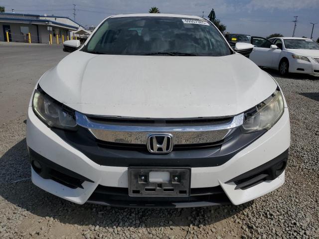 Photo 5 from auction – 2018 HONDA CIVIC EX with VIN 2HGFC2F77JH514248