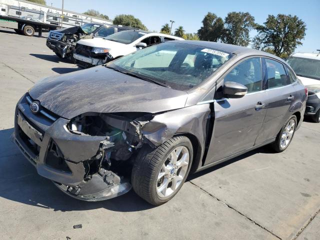 FORD FOCUS TITANIUM 2012 with VIN 1FAHP3J29CL268036 - Photo from auction