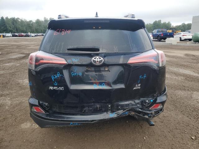 Photo 6 from auction – 2018 TOYOTA RAV4 LE with VIN 2T3BFREV3JW811711