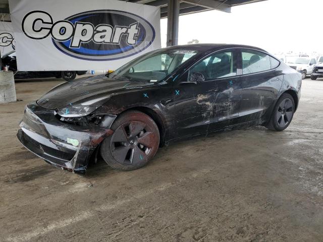 TESLA MODEL 3 2023 with VIN 5YJ3E1EA7PF618479 - Photo from auction