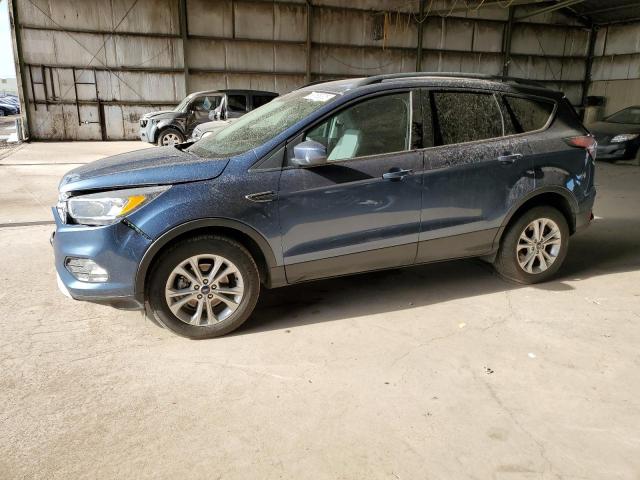 FORD ESCAPE SE 2018 with VIN 1FMCU0GD8JUC36685 - Photo from auction