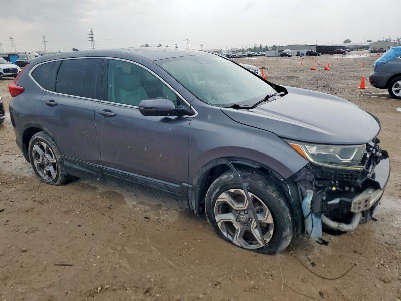 Photo 4 from auction – 2017 HONDA CR-V EXL with VIN 5J6RW2H84HL026374