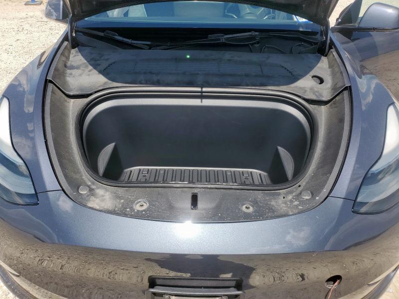 Photo 12 from auction – 2023 TESLA MODEL Y with VIN 7SAYGAEE9PF857649